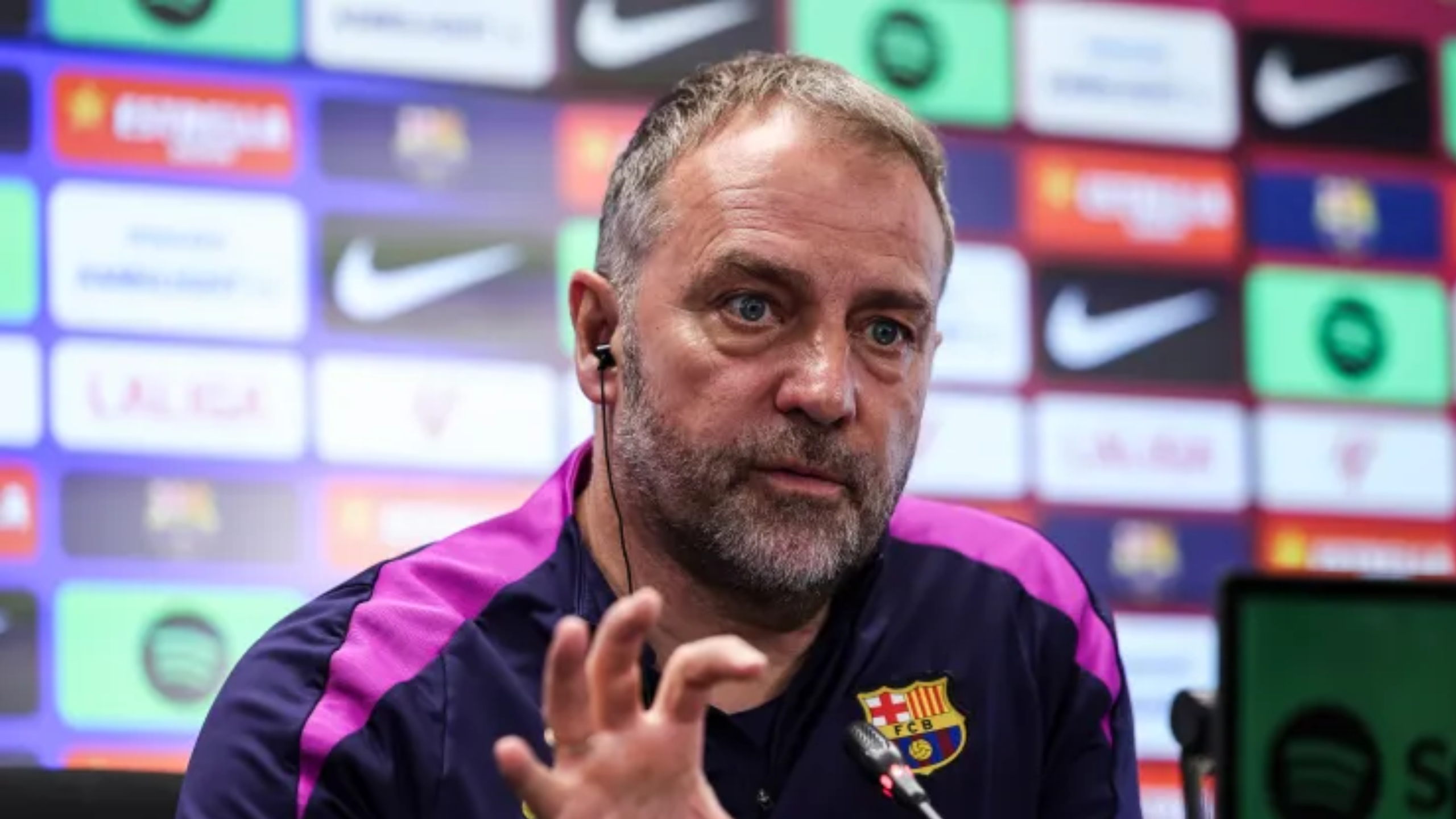 Hansi Flick on the Barcelona touchline reacts to the Champions League elimination against Atlético Madrid