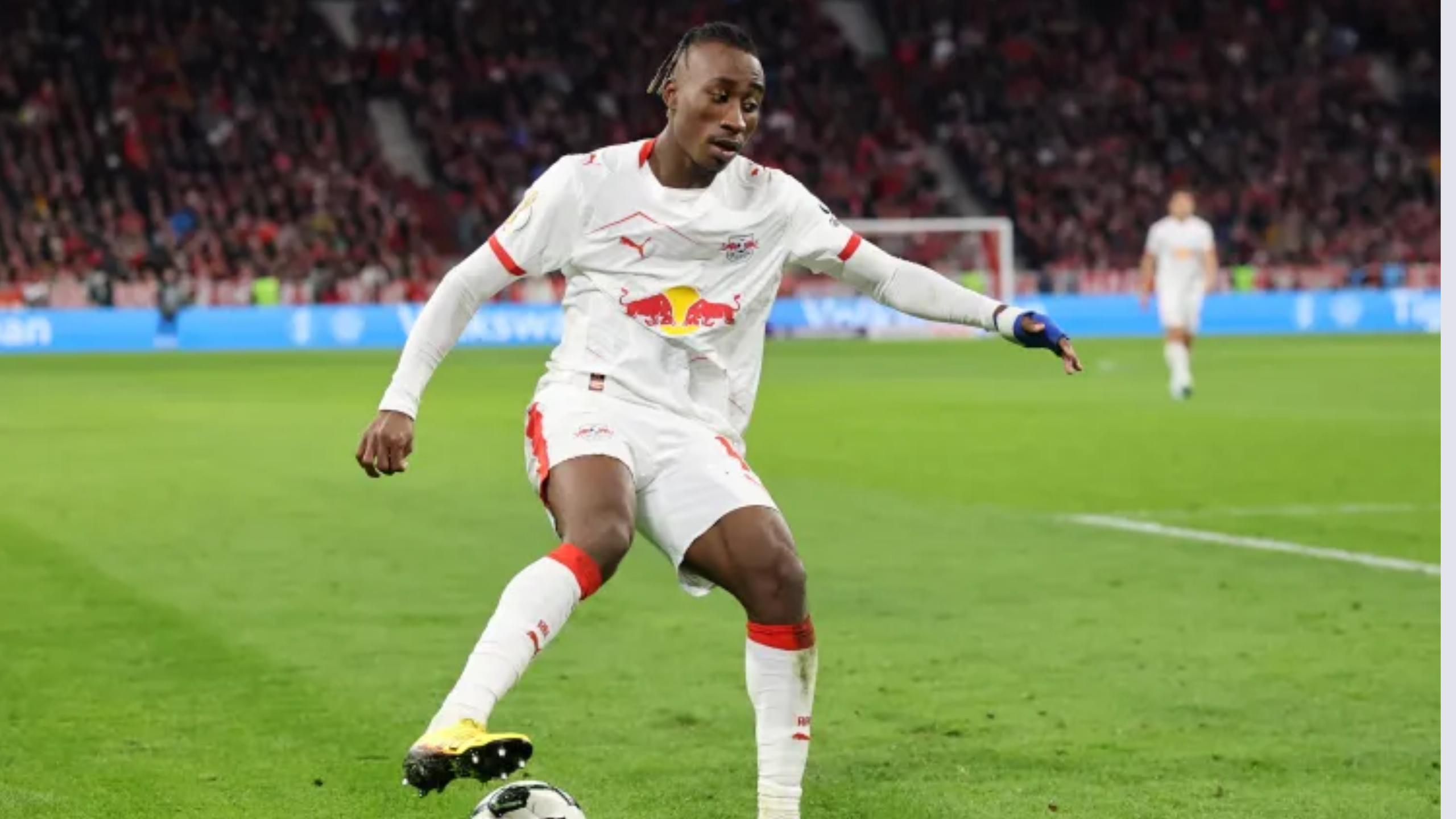 Yan Diomandé celebrates a goal for RB Leipzig in the Bundesliga 2025–26 season"